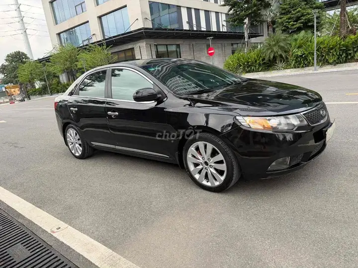 Kia Cerato 2010 Черный Импортный 5 мест