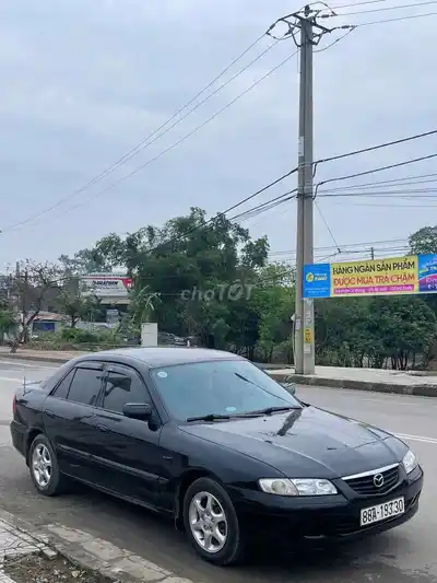 Mazda 626, механическая коробка передач, бензин, черный, 5 мест