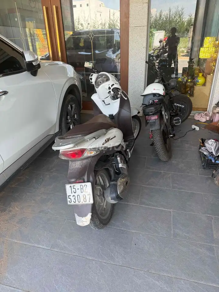 Honda SH Mode белый скутер