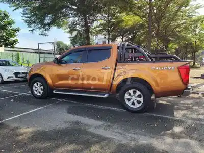 Nissan Navara 2016, задний привод, автомат, золотистый