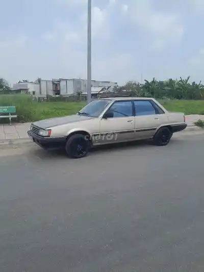 Toyota Camry V10 1984 песочный