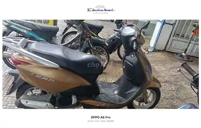 Honda Lead золотисто-бронзовый скутер