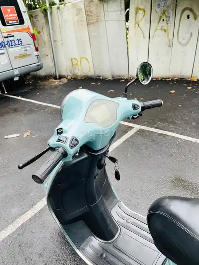 Б/у электрический скутер JVC Vespa бирюзовый