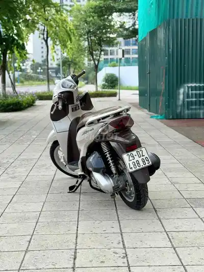 Honda SH Mode 2021 серо-коричневый, красивый номер 8889