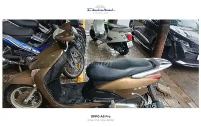 Honda Lead золотисто-бронзовый скутер