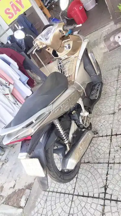 Honda Air Blade бронзово-золотистого цвета