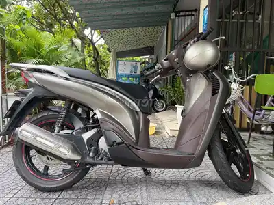 Honda SH125 серого цвета