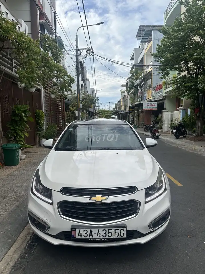 Chevrolet Cruze белый, люк