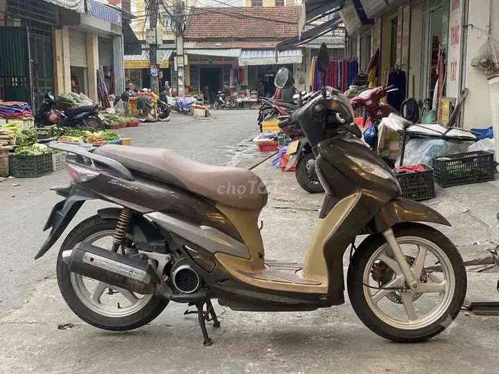 SYM Shark 125 2011 Коричнево-желто-серый