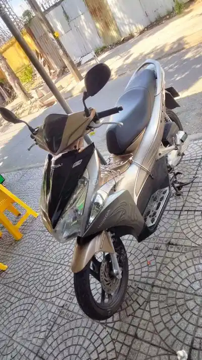 Honda Air Blade бронзово-золотистого цвета