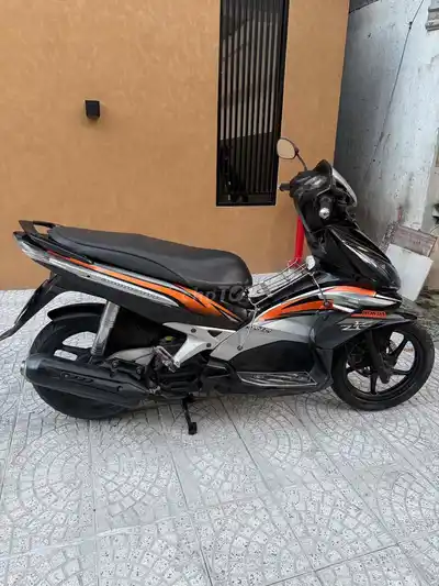 Honda Air Blade 2010 черный оранжевый