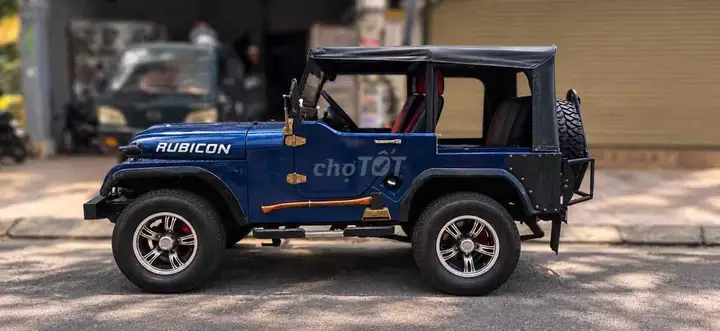 Jeep CJ5 Rubicon 1975, синий, механическая коробка передач