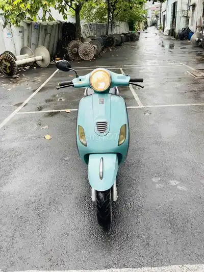 Б/у электрический скутер JVC Vespa бирюзовый