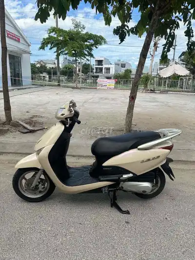 Honda Lead кремовый, скутер