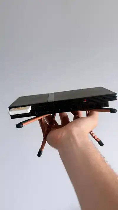 PlayStation 2 с джойстиками и играми