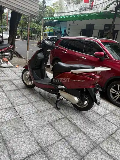 Honda Lead красный скутер