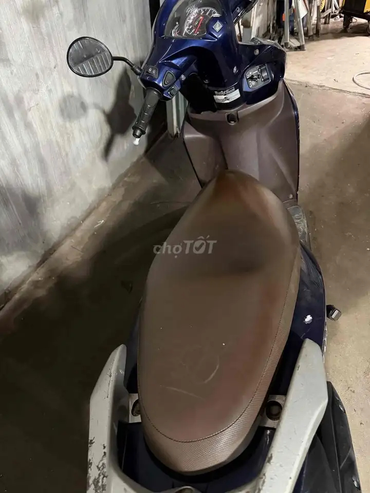 Honda Vision синего цвета