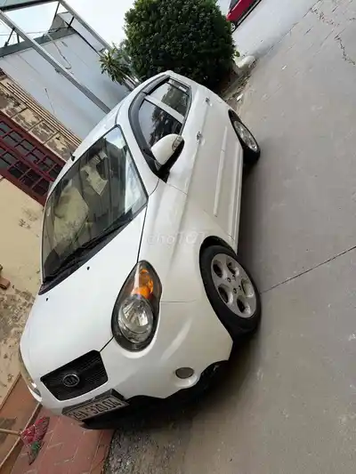 Номера импортных деталей Kia Morning SLX 2009 белого цвета