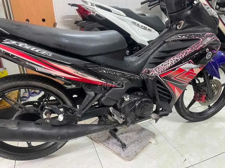 Yamaha Exciter 50, черный, красный, синий