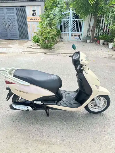 Honda Lead кремовый, скутер