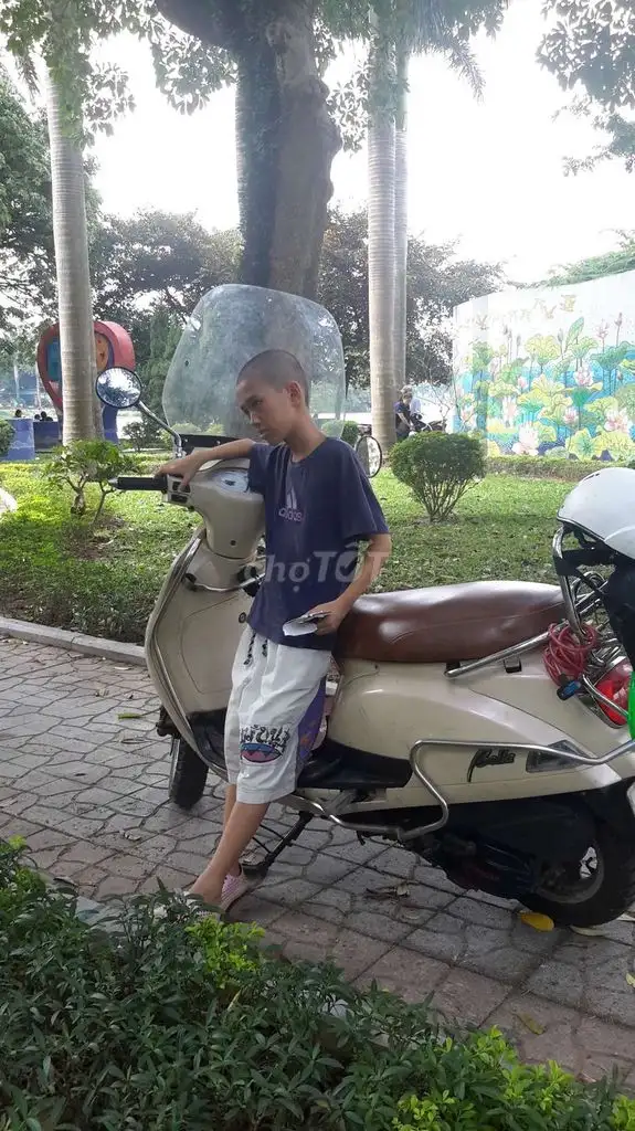 Японский скутер Suzuki
