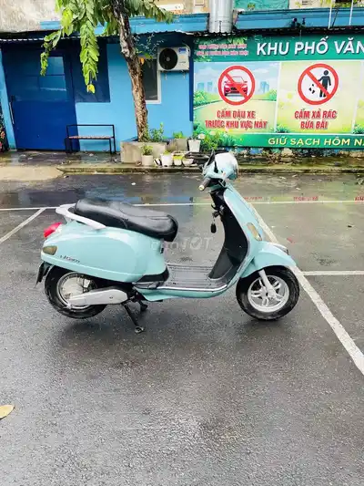 Б/у электрический скутер JVC Vespa бирюзовый