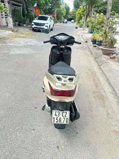 Honda Lead кремовый, скутер