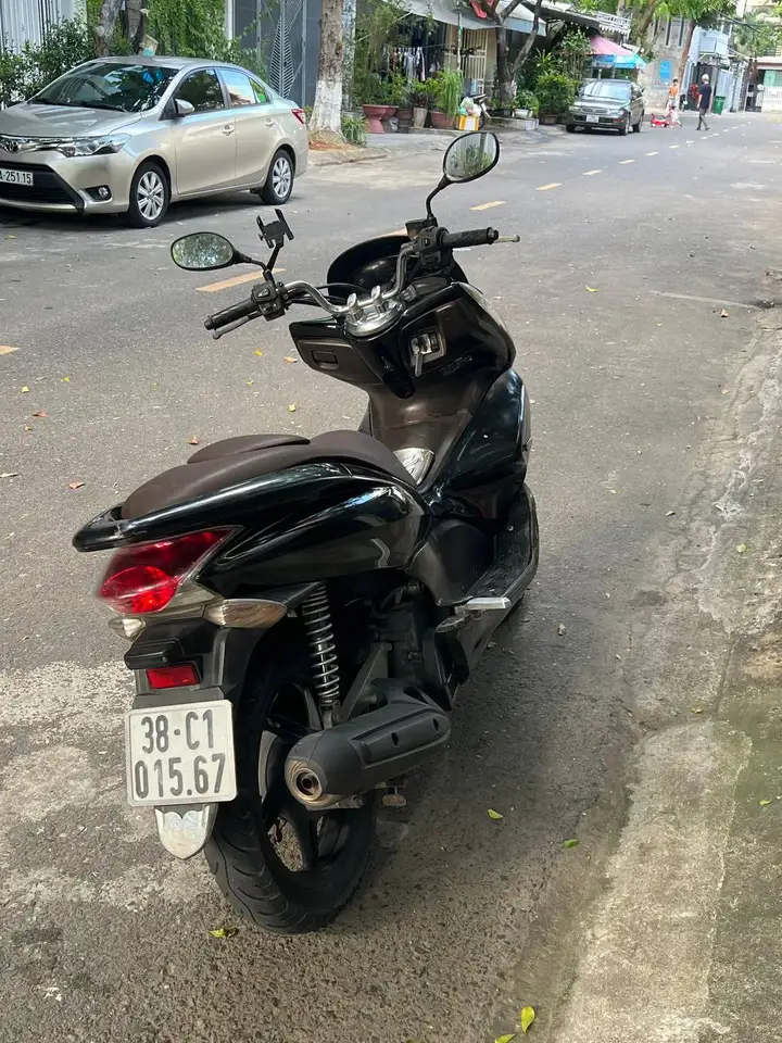 Honda PCX 1 поколения 2011 года