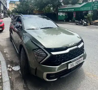 Kia Sportage 2022 2.0 Signature X-Line, зеленый хаки