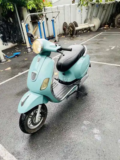 Б/у электрический скутер JVC Vespa бирюзовый