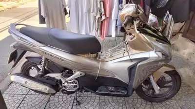 Honda Air Blade бронзово-золотистого цвета