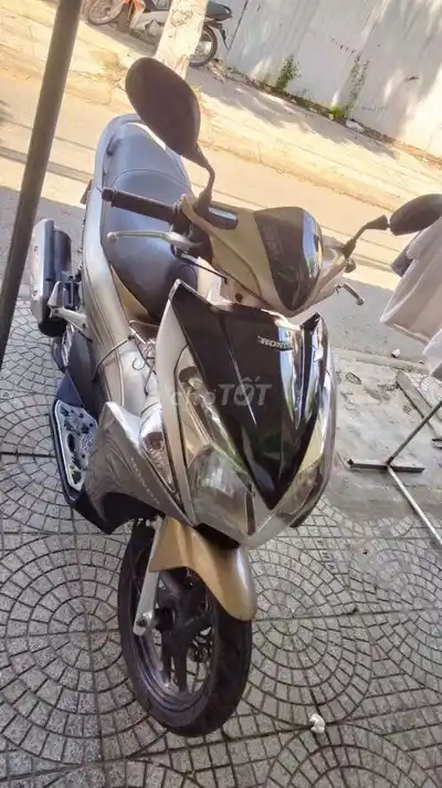 Honda Air Blade бронзово-золотистого цвета
