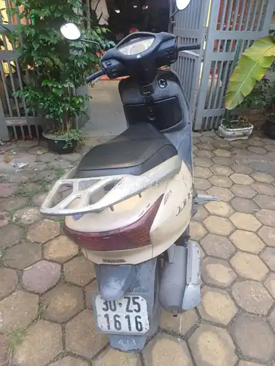 Honda Lead бежевый скутер
