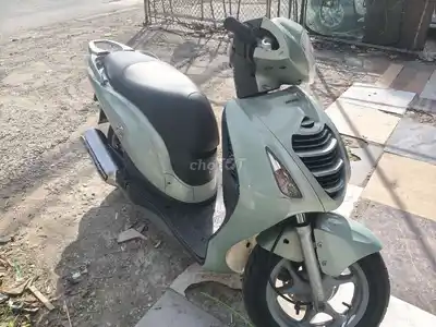 Мопед Honda PS 2009 зеленого цвета