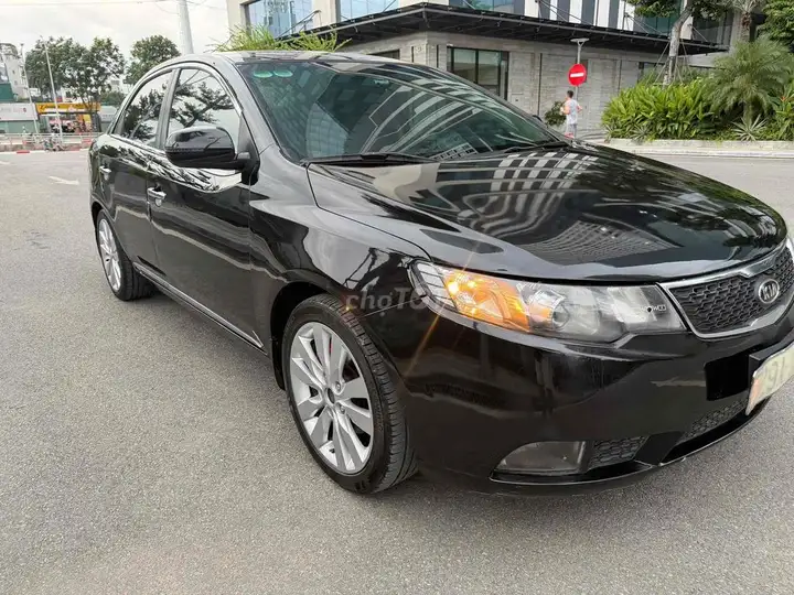 Kia Cerato 2010 Черный Импортный 5 мест