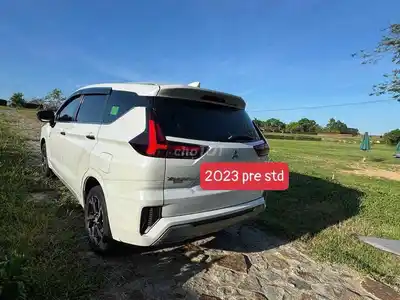 Mitsubishi Xpander Premium 2023 Белый 7 мест
