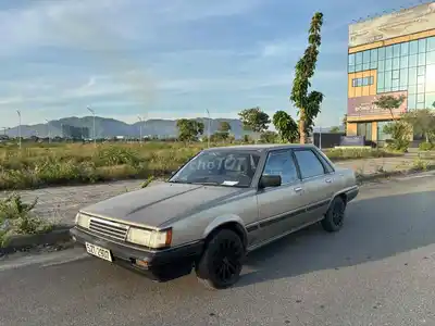 Toyota Camry V10 1984 песочный