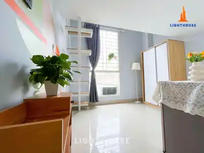Двухуровневая квартира с мебелью и лифтом на Nguyen Van Dau - рядом с Phan Van Tri