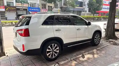 KIA Sorento 2015 2.4 AT 140 тыс. км Белый