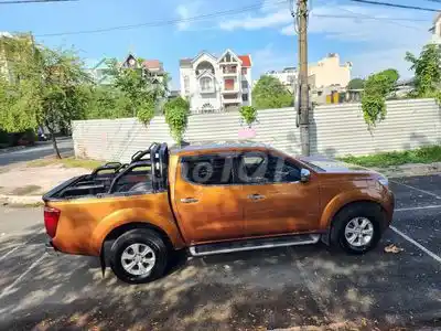Nissan Navara 2016, задний привод, автомат, золотистый