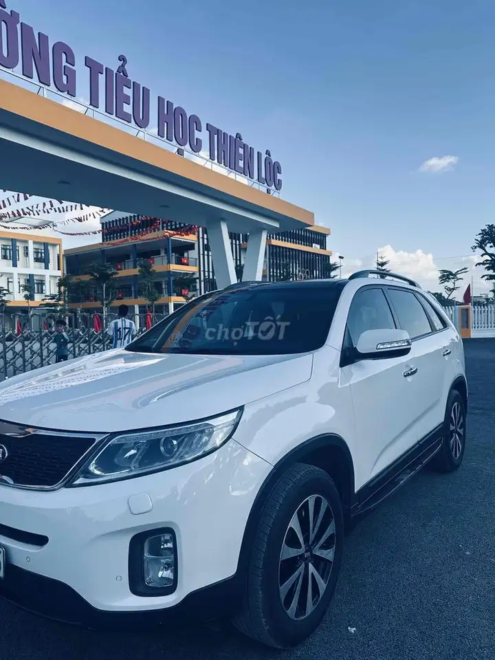 Kia Sorento 2016 белый 7 мест