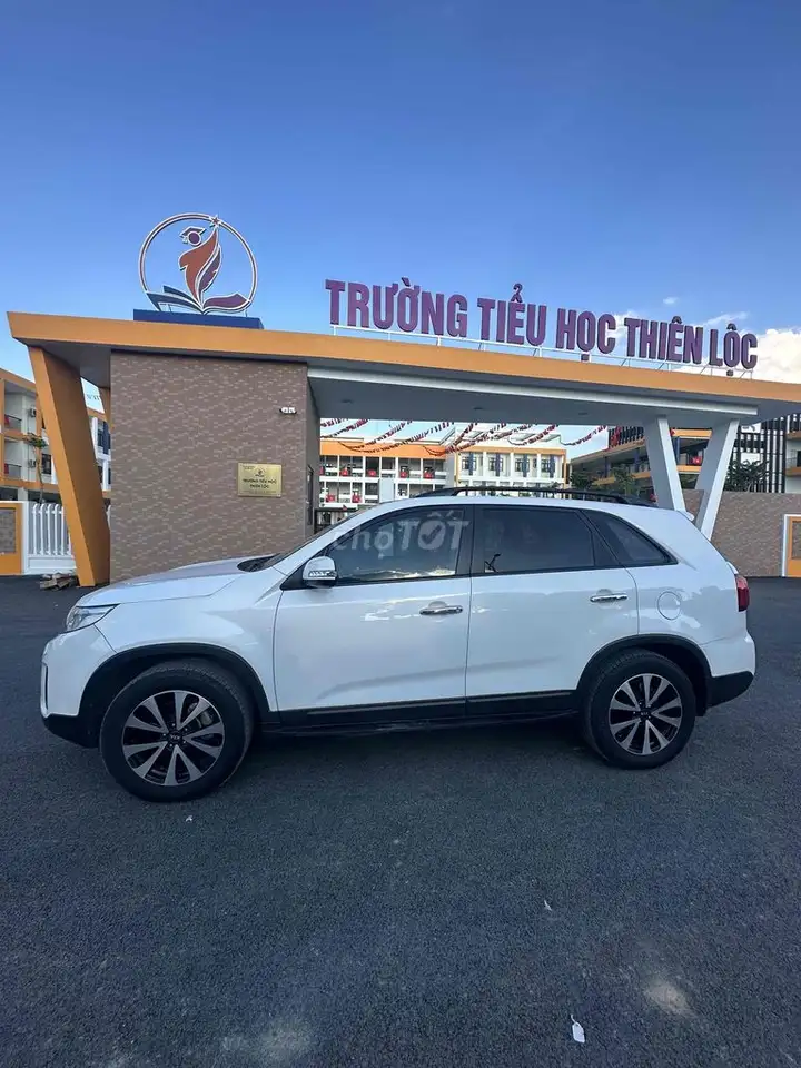 Kia Sorento 2016 белый 7 мест